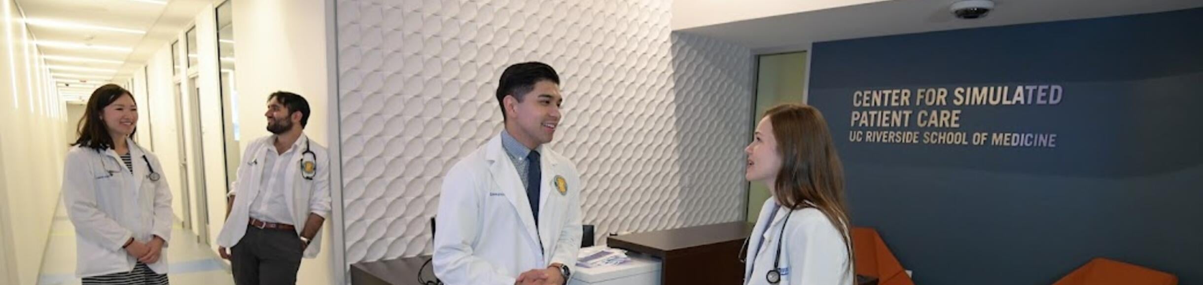 Students in the lobby of the Center for Simulated Patient Care