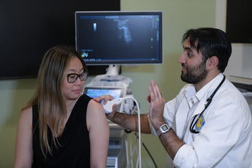 SP receiving ultrasound from a medical student